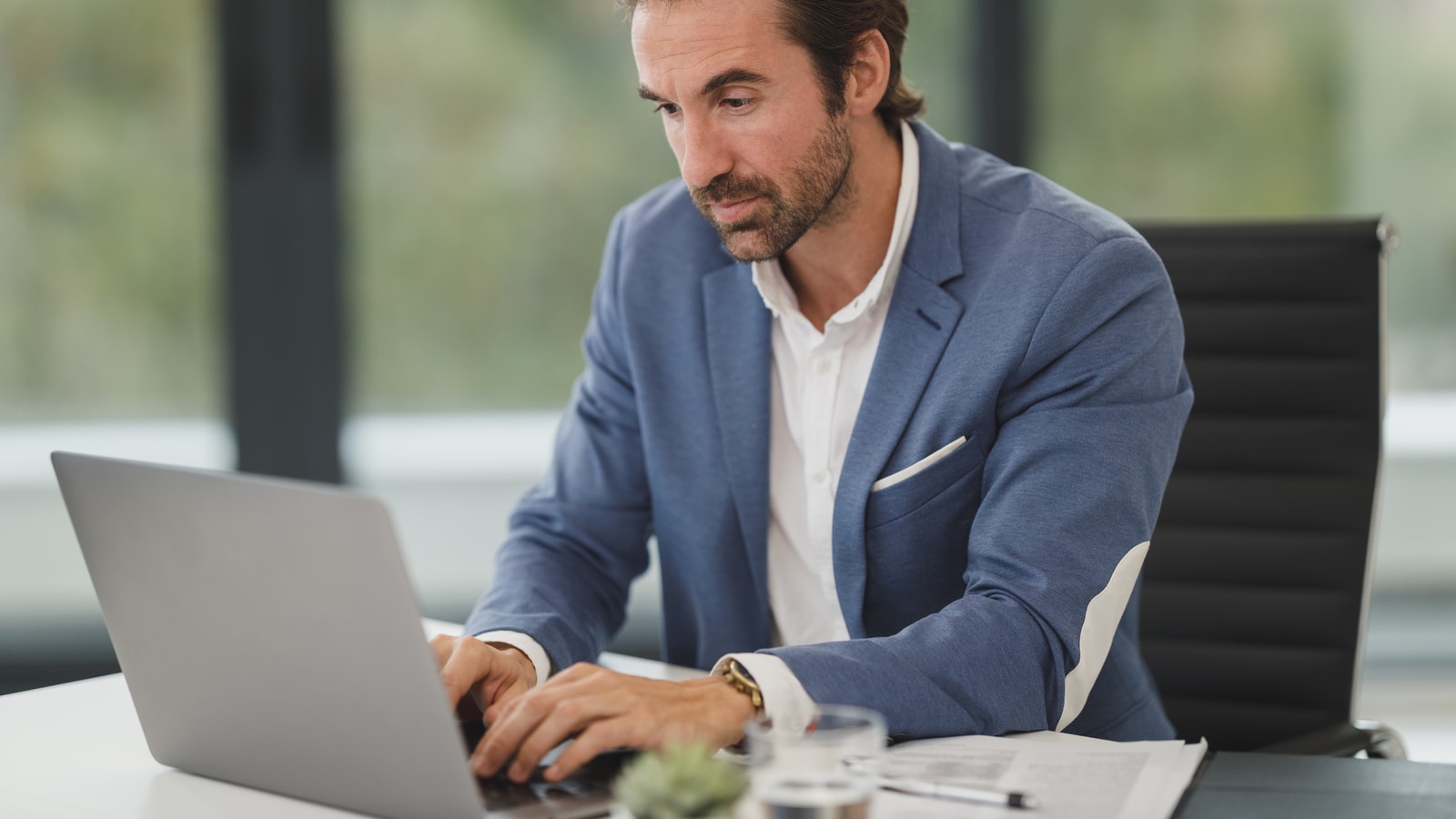 Business audit and compliance documents prepared for a review meeting