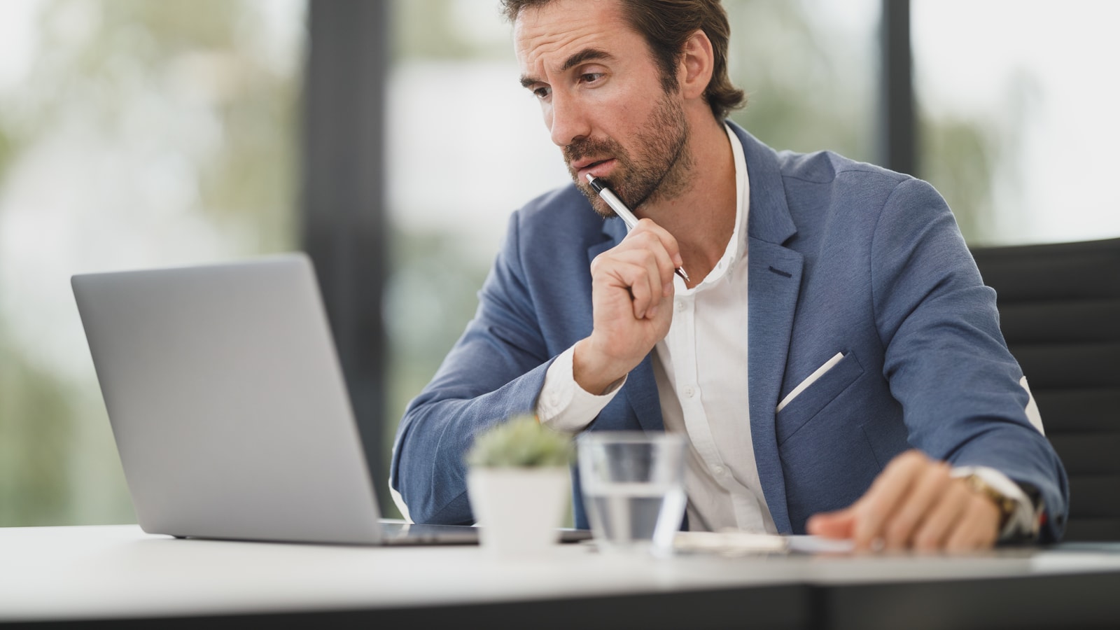 Business audit and compliance documents prepared for a review meeting