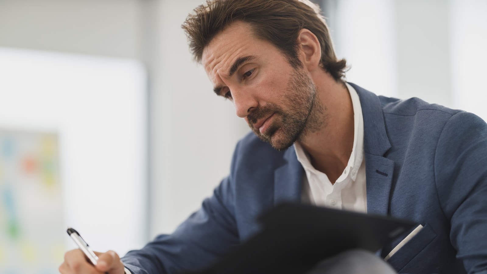 Business audit and compliance documents prepared for a review meeting