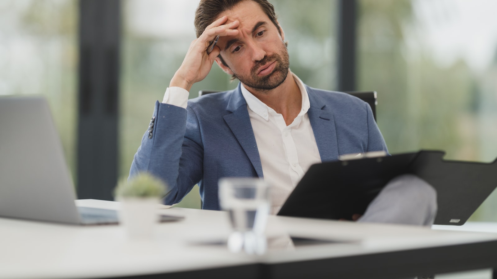 Business audit and compliance documents prepared for a review meeting