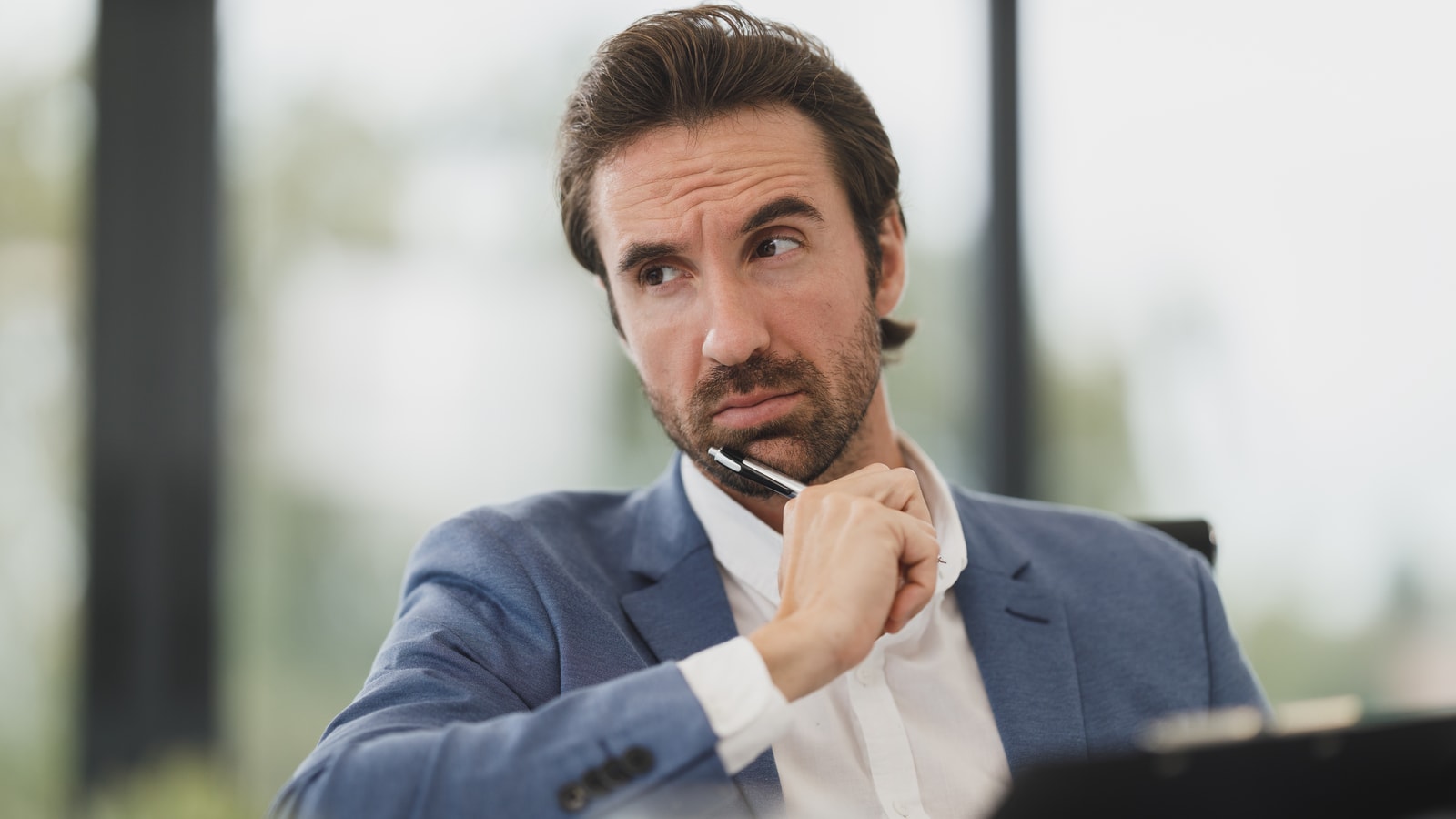 Business audit and compliance documents prepared for a review meeting