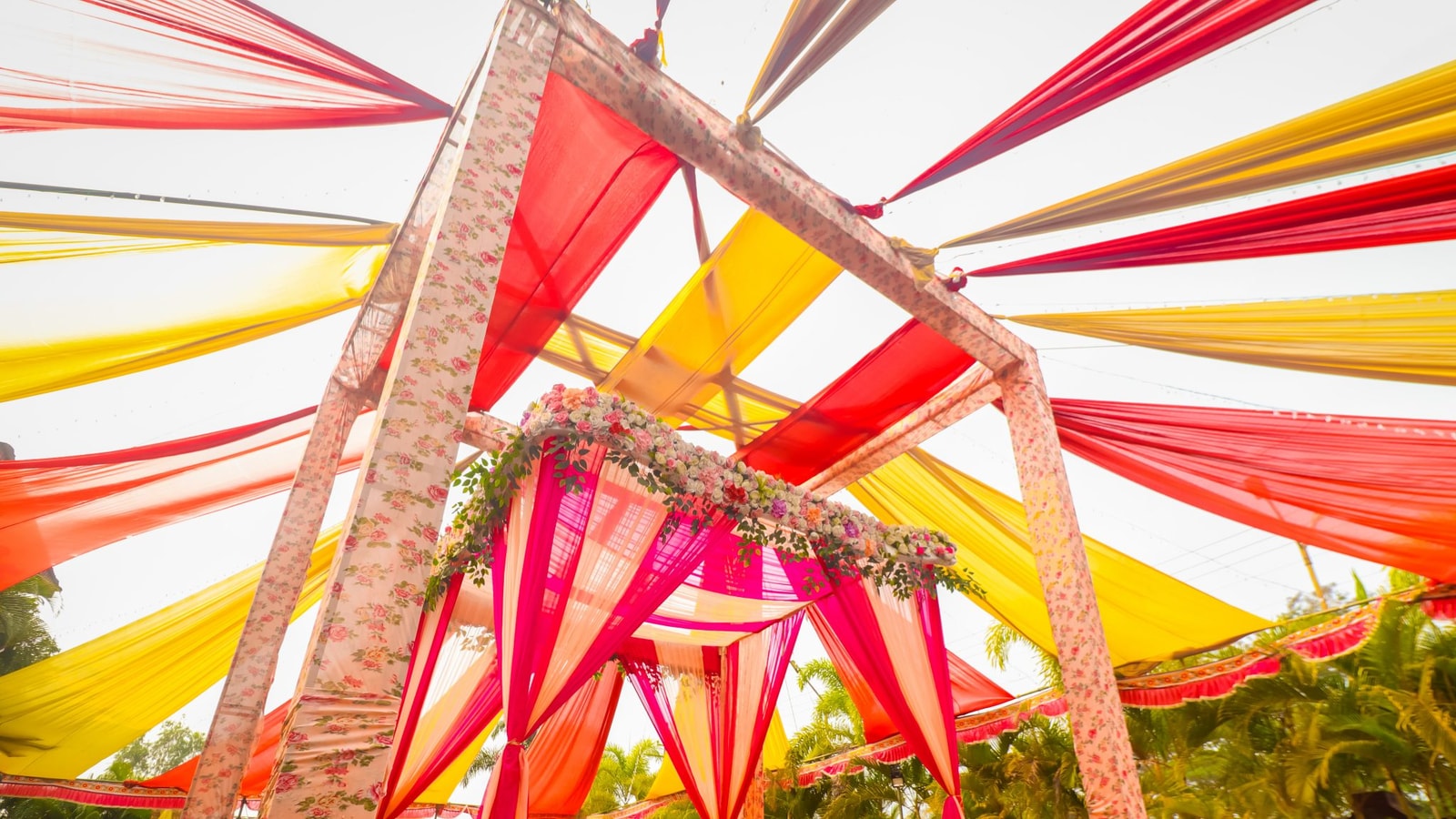 A Beautifully Decorated Wedding Mandap, Graced With The Simplicity And Richness Of