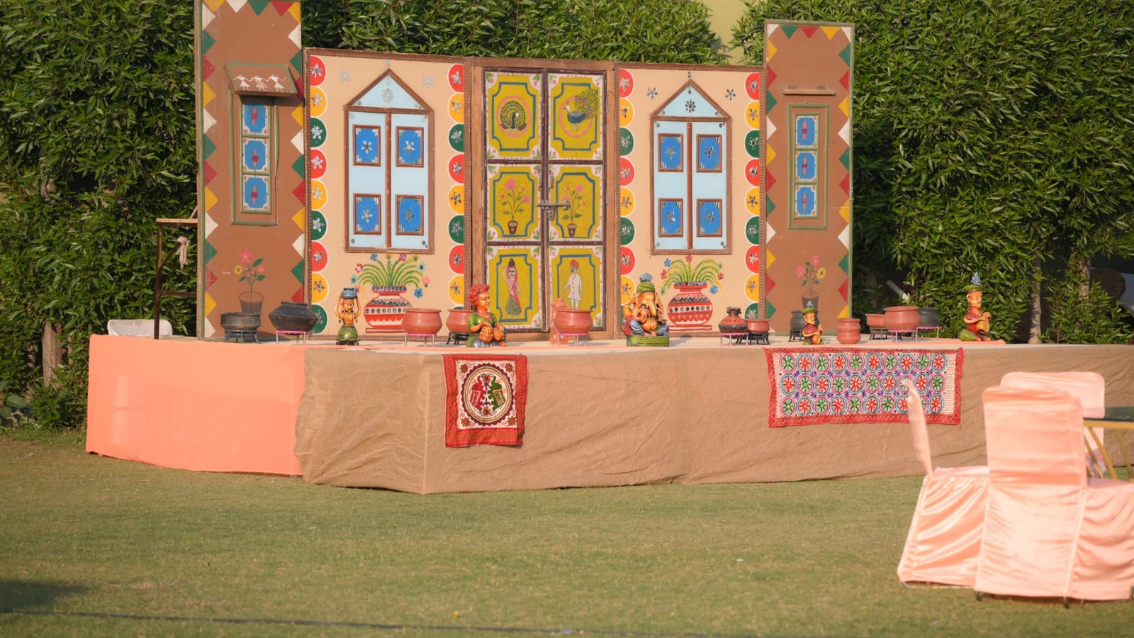 Outdoor Stage With Colourful Hand-made Decorations In A Garden